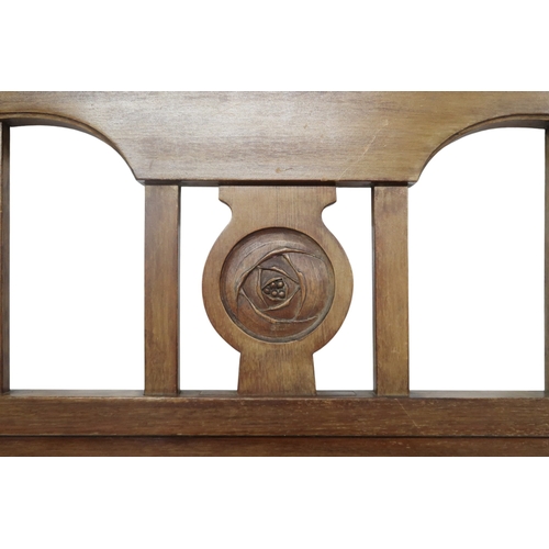 2046 - AN EARLY 20TH CENTURY MAHOGANY SINGLE HEAD AND FOOTBOARD each with arched slatted back with cen... 