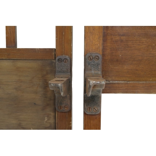 2046 - AN EARLY 20TH CENTURY MAHOGANY SINGLE HEAD AND FOOTBOARD each with arched slatted back with cen... 