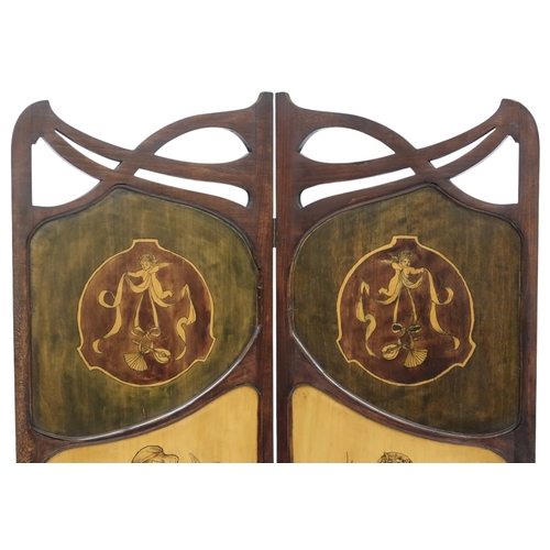 2048 - AN ART NOUVEAU  MAHOGANY SCREEN with pierced decorative tops over panels painted with cherubs bearin... 