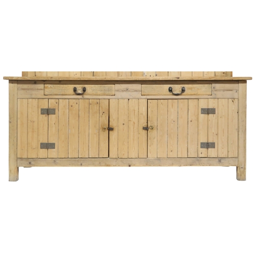 2051 - A LARGE PINE FARMHOUSE STYLE KITCHEN DRESSERconverted from an earlier larder table dresser has a lat... 