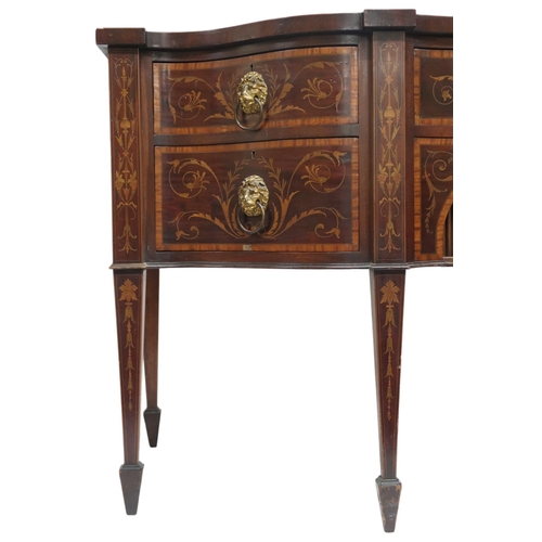 2055 - A GEORGIAN MAHOGANY AND CROSSBAND INLAID SERPENTINE FRONT SIDEBOARD with long central drawer over pa... 