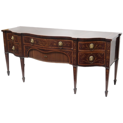 2055 - A GEORGIAN MAHOGANY AND CROSSBAND INLAID SERPENTINE FRONT SIDEBOARD with long central drawer over pa... 