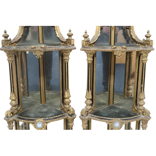 2057 - A PAIR OF 19TH CENTURY LOUIS XV STYLE GILT GESSO MIRROR BACKED CORNER WHAT-NOTSeach capped with cera... 