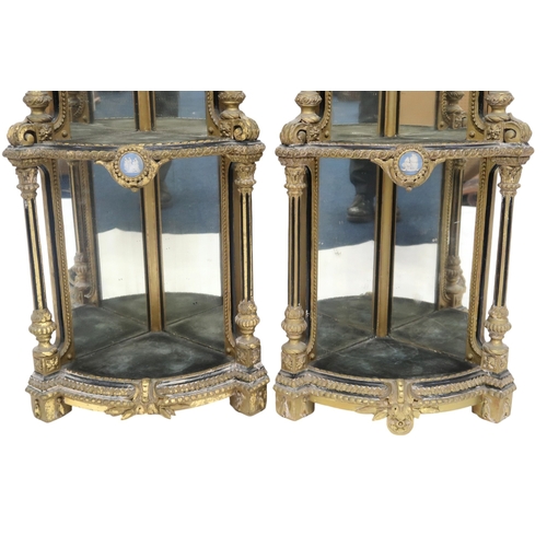 2057 - A PAIR OF 19TH CENTURY LOUIS XV STYLE GILT GESSO MIRROR BACKED CORNER WHAT-NOTSeach capped with cera... 