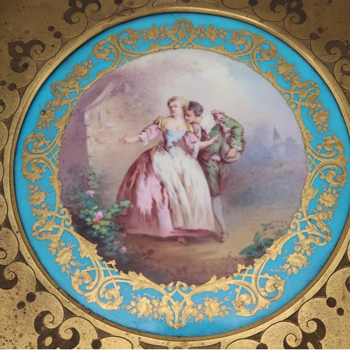 205 - A late 19th century French brass and Sevres style writing box, the panel depicting a courting couple... 