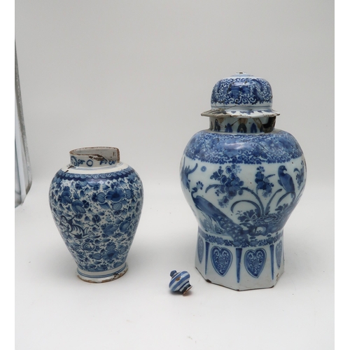 208 - Two Dutch delft vases, one with a lid