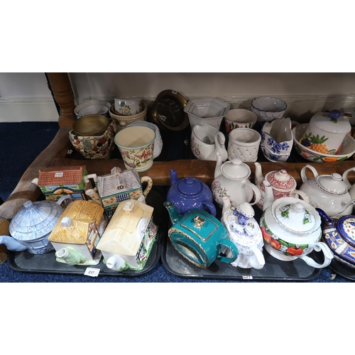 237 - A collection of teapots, some novelty, ceramic planters, drinking glasses etc