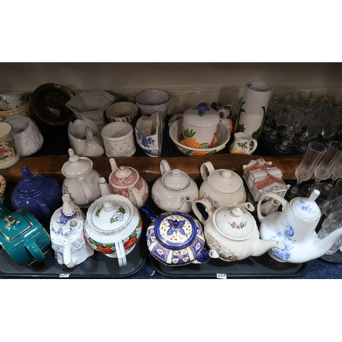 237 - A collection of teapots, some novelty, ceramic planters, drinking glasses etc