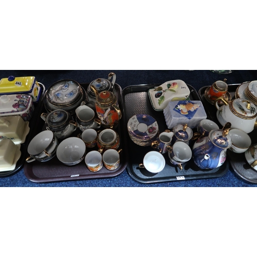 242 - A collection of butter dishes, floral ceramic posies, Japanese tea and coffee wares, plated goblets,... 