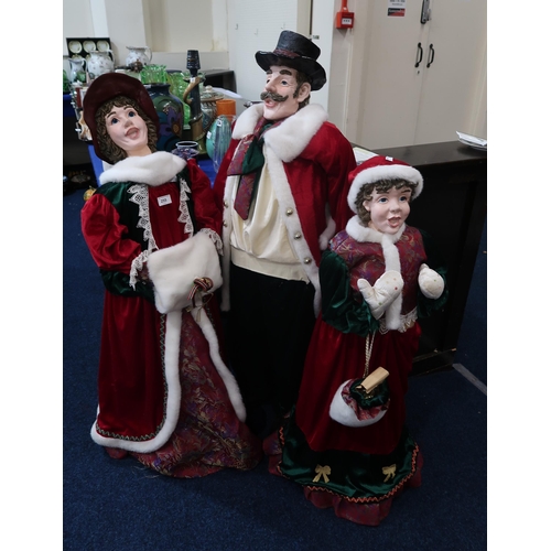 255 - A group of three Victorian style Christmas singers