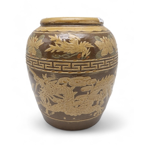 263 - A large Chinese stoneware jar, decorated with a dragon