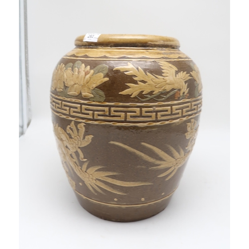 263 - A large Chinese stoneware jar, decorated with a dragon