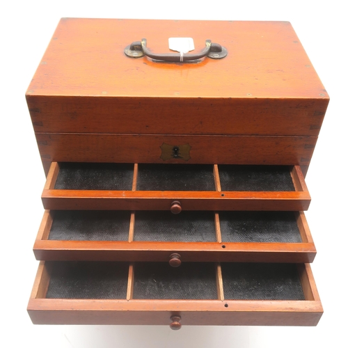 514 - A mahogany multi-drawer dentist's cabinet by Cash & Sons, London, measuring approx. 34cm high x ... 