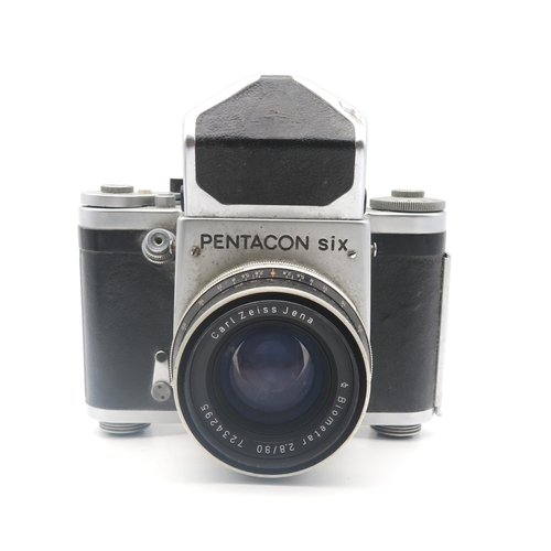 518 - A Mamiya C33 Twin Lens Reflex (TLR) medium format camera, fitted with Sekor 1:4.5 f=135mm lenses; a ... 