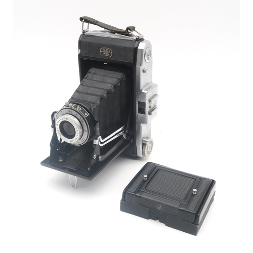 518 - A Mamiya C33 Twin Lens Reflex (TLR) medium format camera, fitted with Sekor 1:4.5 f=135mm lenses; a ... 