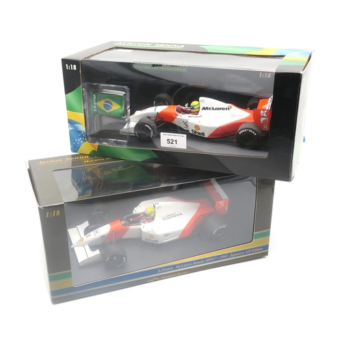 521 - A boxed 1:18-scale model of Ayrton Senna's McLaren Honda MP4/7 - 1992 Japanese GP Edition produced b... 