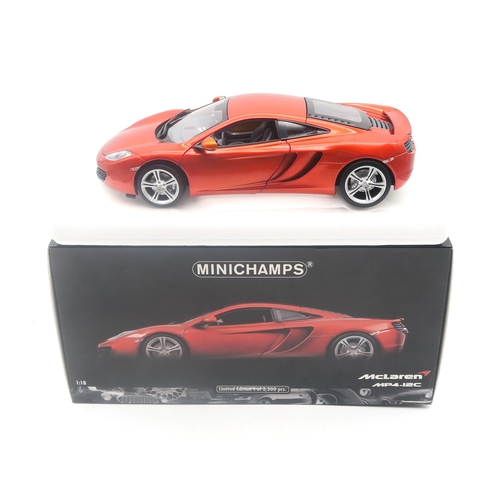 522 - A boxed Autoart Signature 1:18-scale McLaren F1 road car; and a Minichamps McLaren Mp4.12C, limited ... 