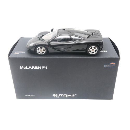 522 - A boxed Autoart Signature 1:18-scale McLaren F1 road car; and a Minichamps McLaren Mp4.12C, limited ... 