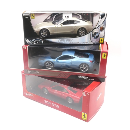 523 - A boxed Hot Wheels 1:18-scale Ferrari 612 Scaglietti, 458 Italia and 308 GTB (3)