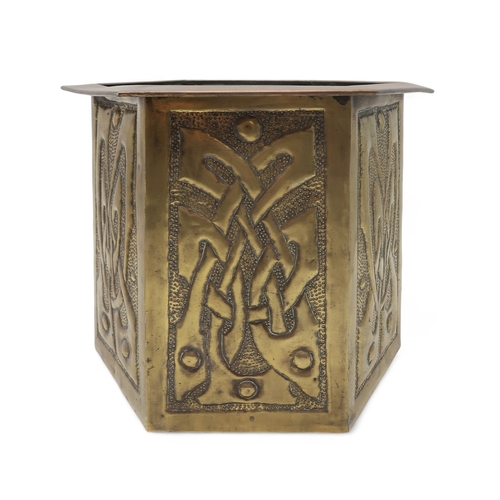 2281 - A SCOTTISH SCHOOL BRASS HEXAGONAL JARDINIEREeach panel with celtic knotwork, 25cm high, together wit... 