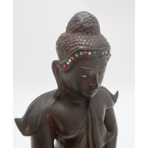 2471 - A BURMESE BRONZE MODEL OF BUDDHA Of traditional form, raised on a throne,19th century,26cm high... 