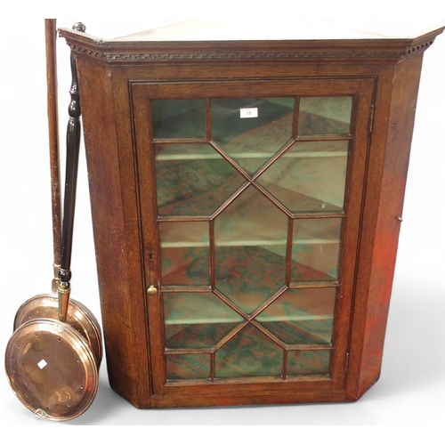 15 - A lot comprising a late 19th century mahogany astragal glazed corner cabinet and two assorted copper... 