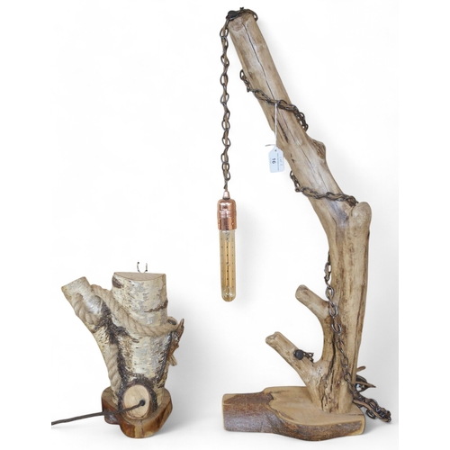 16 - A lot of two assorted contemporary driftwood table lamps tallest with bulb hanging from chain with b... 