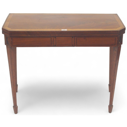 45 - A late 19th century mahogany and satinwood inlaid fold over card table on square tapering supports, ... 