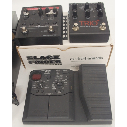 469 - A mixed lot to include an electro-harmonix Black Finger Compressor with box, a TC.Helicon Voicetone ... 