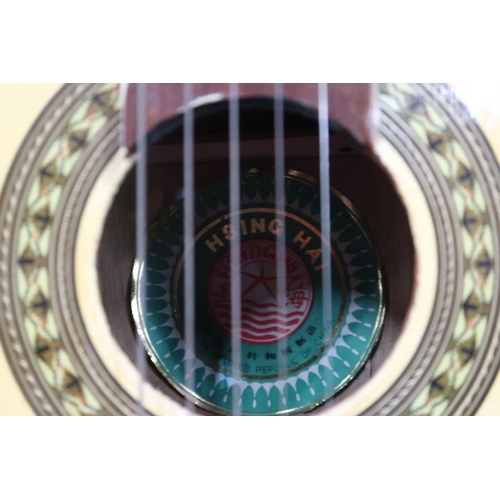 473 - Three nylon string Spanish style guitars, consisting of an Angelica 2851, a Hsing Hai guitar an... 