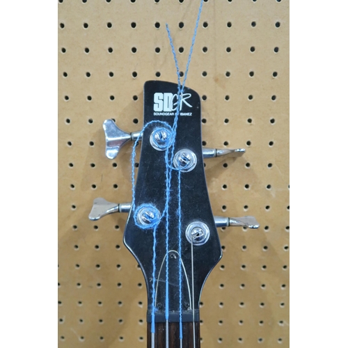 476 - An Ibanez SR 300 DX electric bass guitar, with 24 frets and a deep green double cutaway body