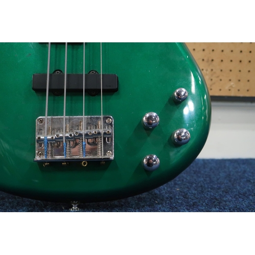 476 - An Ibanez SR 300 DX electric bass guitar, with 24 frets and a deep green double cutaway body