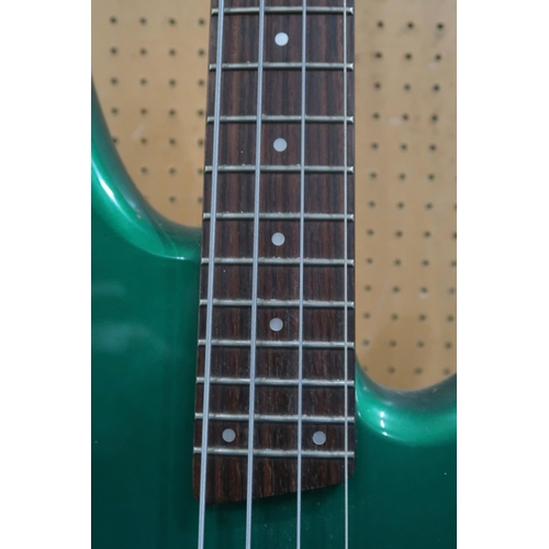 476 - An Ibanez SR 300 DX electric bass guitar, with 24 frets and a deep green double cutaway body