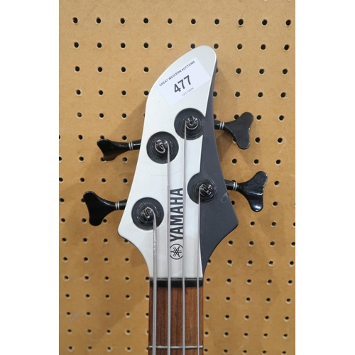 477 - A Yamaha RBX-374 electric bass guitar, with 24 frets and a silver double cutaway body