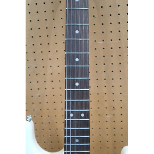 478 - Mooer Gtrs Electric Guitar, in off-white, with a 22 fret board, a whammy bar and a double cutaway bo... 