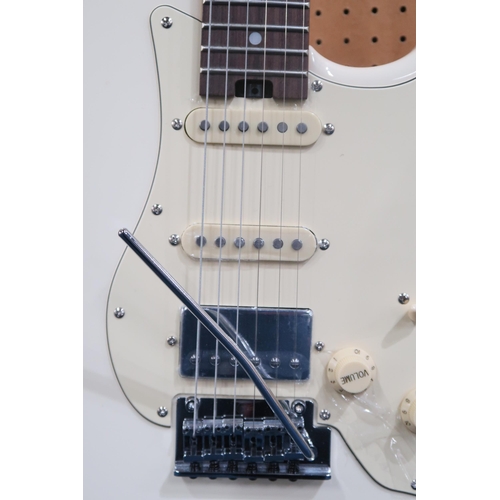 478 - Mooer Gtrs Electric Guitar, in off-white, with a 22 fret board, a whammy bar and a double cutaway bo... 