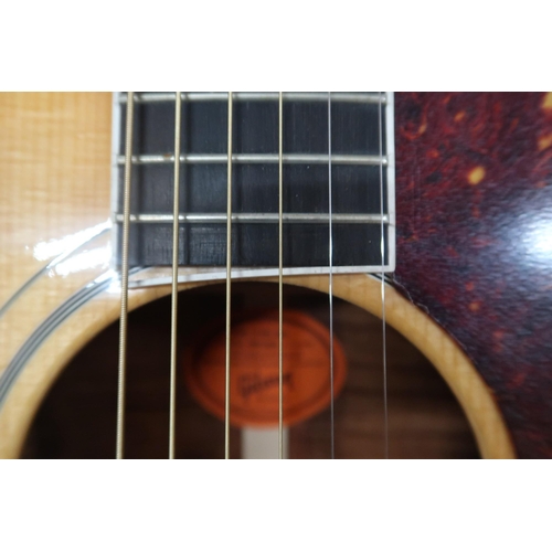 482 - GIBSON J-185 KOA c.2000sWith Koa back and sides, spruce top, ebony fretboard with abalone inlay. Mad... 