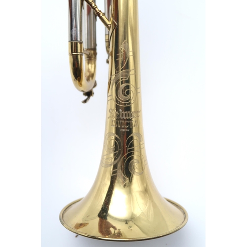 483 - A Brass Two-Tone Selmer Invicta trumpet in case, with a mouthpiece and two moulded mutes