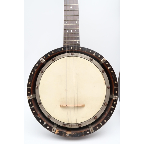 484 - A W Temlett London six-string banjo guitar with the nut and saddle set up as a four string, and also... 