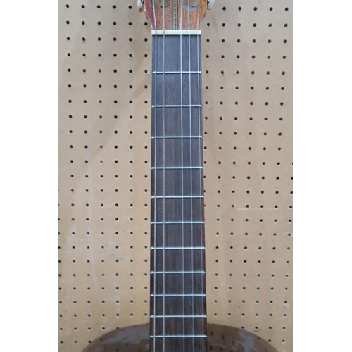 486 - A vintage NANYO classical guitar, Model no. 1683, hand made in Japan, with a vintage hard case. Also... 