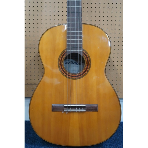 486 - A vintage NANYO classical guitar, Model no. 1683, hand made in Japan, with a vintage hard case. Also... 