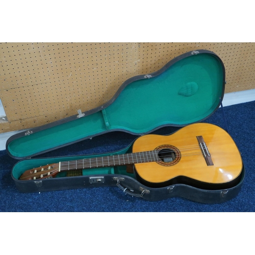 486 - A vintage NANYO classical guitar, Model no. 1683, hand made in Japan, with a vintage hard case. Also... 