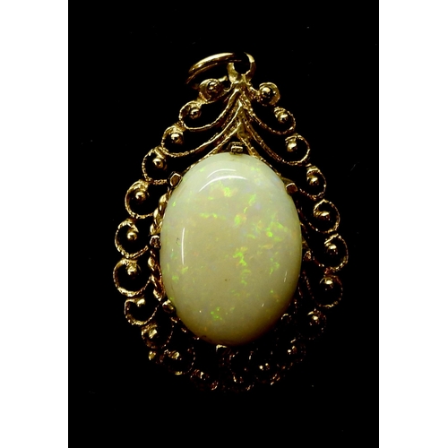 705 - A 9ct gold pendant, set with an approx 14mm x 10mm white opal, weight 3.1gms together with a 18ct go... 