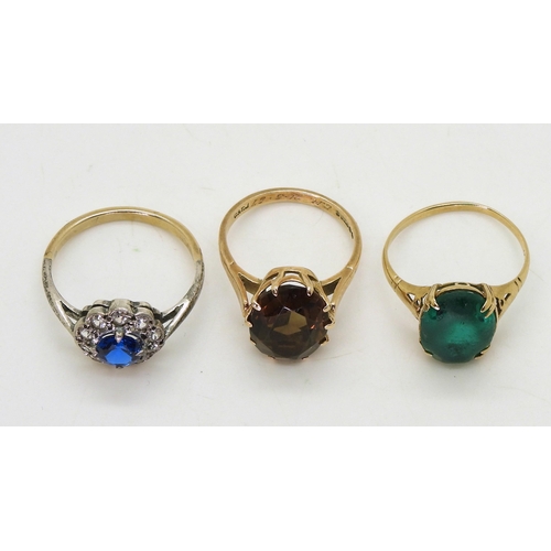 717 - A 9ct smoky quartz ring, size M1/2, a 9ct green glass ring, size O1/2 (af) and a yellow and white me... 