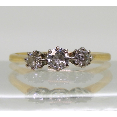 729 - An 18ct gold three stone diamond ring, set with three old cut diamonds with an estimated approx diam... 