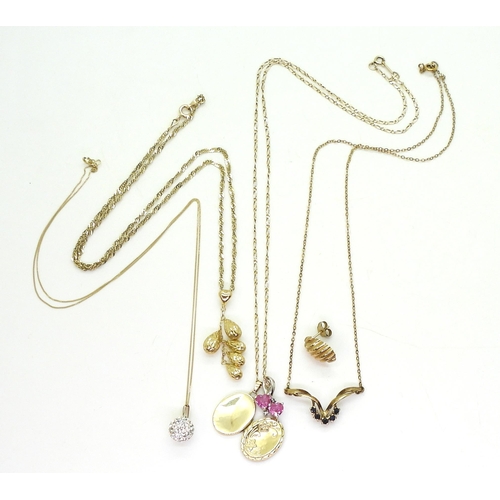 736 - A collection of 9ct pendant and chains, to include a pink gem and diamond pendant, a  and a sin... 