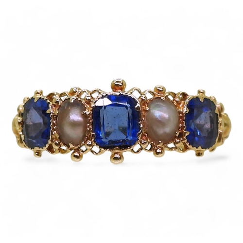 737 - A Victorian blue gem and pearl ring,made in bright yellow metal, size Q1/2, weight 2.1gms