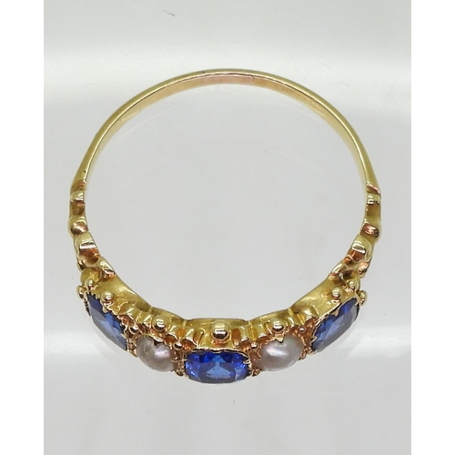 737 - A Victorian blue gem and pearl ring,made in bright yellow metal, size Q1/2, weight 2.1gms