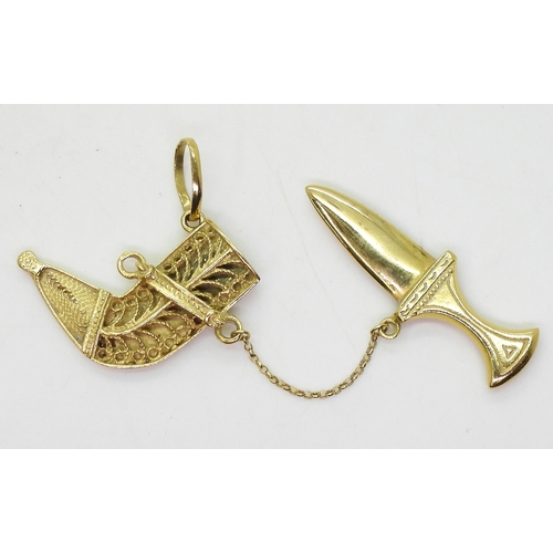 759 - An 18k gold Arabic sword and filigree scabbard pendant weight 10.2gms