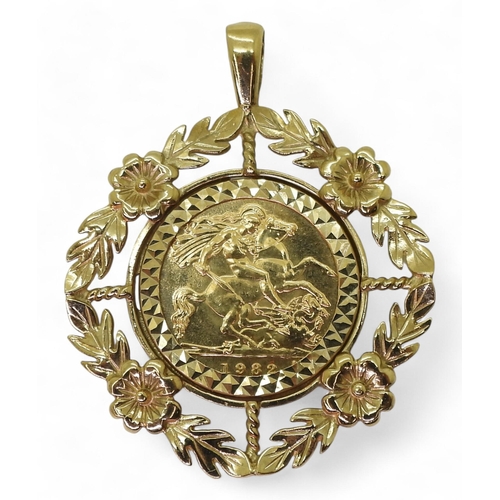 A 1982 half gold sovereign in a 9ct gold rose pattern pendant mount, weight 9.2gms